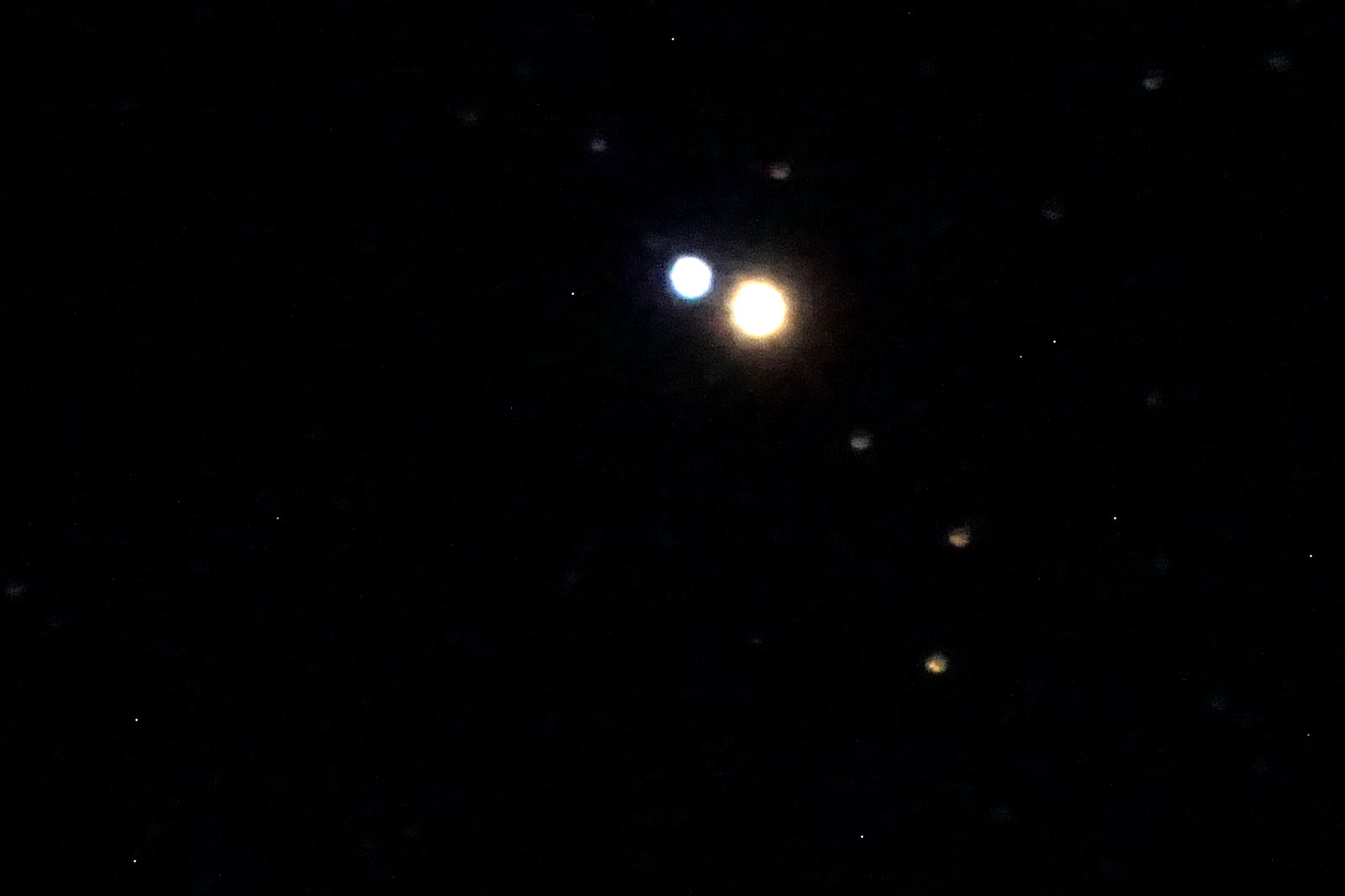 Albireo's gold and blue stars near the middle of the picture