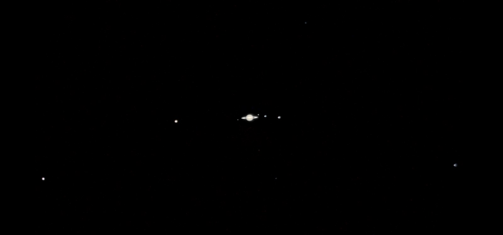 Saturn and seven of its moons
