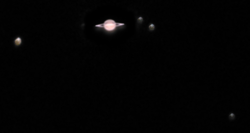 Saturn and five of its moons